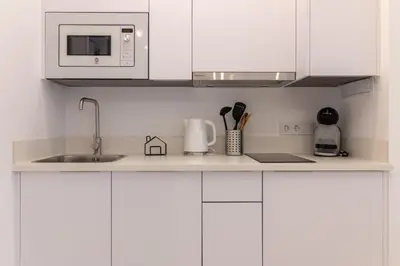 Una cocina o zona de cocina en Apartamentos BN Suite Centro