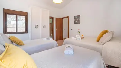Cama o camas de una habitación en Casa Ales Riogordo by Ruralidays