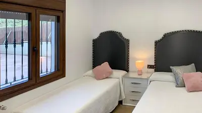 Cama o camas de una habitación en Casa Ales Riogordo by Ruralidays