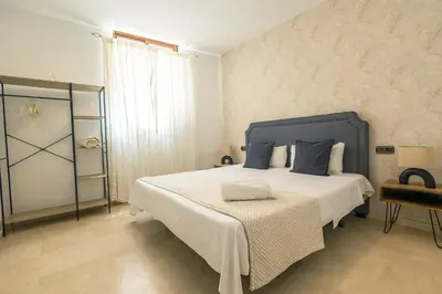 Cama o camas de una habitación en Grande apartamento familiar