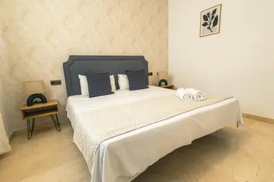 Cama o camas de una habitación en Grande apartamento familiar