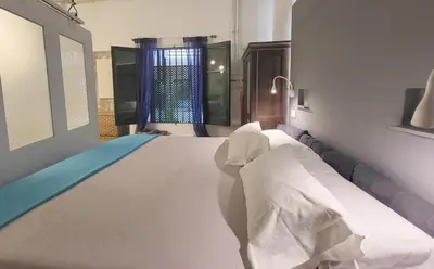 Cama o camas de una habitación en LOFT SOHO, Free Garage, Downtown
