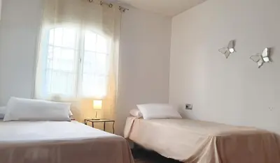Cama o camas de una habitación en Balcon Alameda Downtown