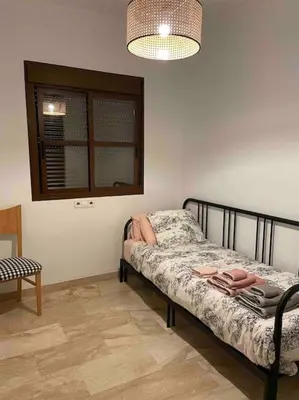 Cama o camas de una habitación en Ático Santa Lucía Terraza y Parking gratuitos