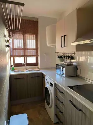 Una cocina o zona de cocina en Ático Santa Lucía Terraza y Parking gratuitos