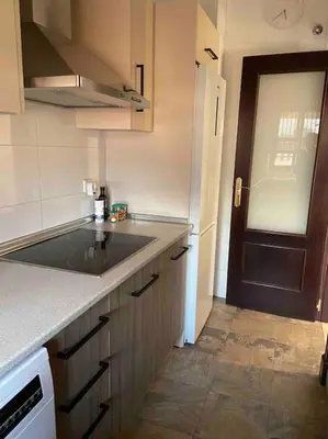 Una cocina o zona de cocina en Ático Santa Lucía Terraza y Parking gratuitos