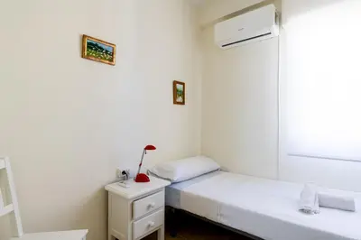 Cama o camas de una habitación en Apartamento Familiar María Auxiliadora