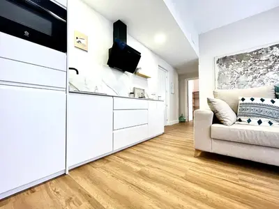 Una cocina o zona de cocina en House in City Garden 1