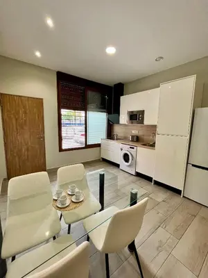 Una cocina o zona de cocina en Califa SuitesGP