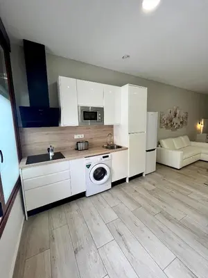 Una cocina o zona de cocina en Califa SuitesGP
