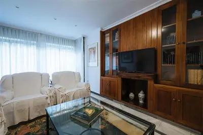Una televisión o centro de entretenimiento en VIVIENDA TURISTICA ATANASIO BARRON- Free PARKING