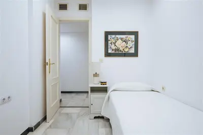 Cama o camas de una habitación en VIVIENDA TURISTICA ATANASIO BARRON- Free PARKING