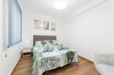 Cama o camas de una habitación en La Ribera y Feria - Casabel Homes
