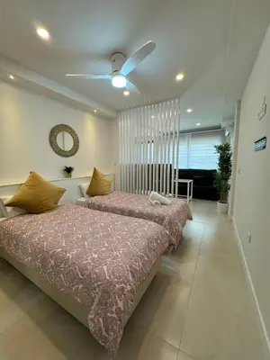 Cama o camas de una habitación en Apartamentos Las Acacias