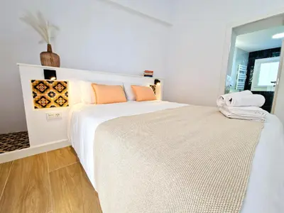 Cama o camas de una habitación en NOVOJAÉN Alojamientos 2 - Edificio vacacional Exclusivo y Tranquilo junto a Catedral