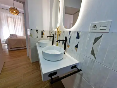 Un baño de NOVOJAÉN Alojamientos 2 - Edificio vacacional Exclusivo y Tranquilo junto a Catedral