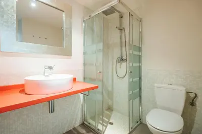 Un baño de Virgen Dolorosa Olehousing