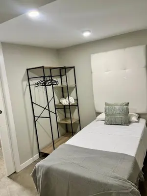 Cama o camas de una habitación en Ribera Suites GP