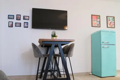 Una televisión o centro de entretenimiento en Carol Home Cordoba