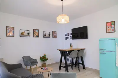 Una televisión o centro de entretenimiento en Carol Home Cordoba