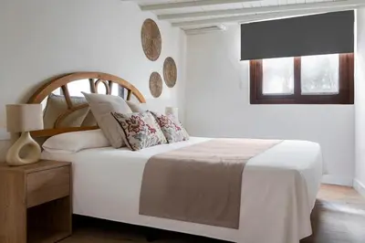 Cama o camas de una habitación en Monkeys Apartments Casa Palacio Bustos Tavera
