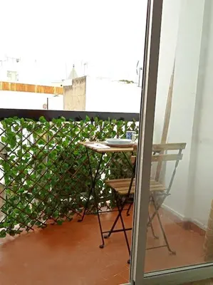 Un balcón o terraza de 2BDR y 1 SALON Bonito y práctico apartamento en la Muralla