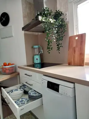 Una cocina o zona de cocina en 2BDR y 1 SALON Bonito y práctico apartamento en la Muralla