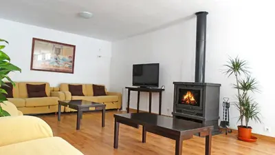 Una televisión o centro de entretenimiento en Casa rural la Fundación