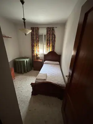 Cama o camas de una habitación en Piso completo, acogedor y cerca del centro