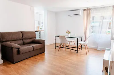 Zona de estar de Reformado y muy tranquilo junto a Puente Romano, 3Hab, aire acondicionado y WiFi
