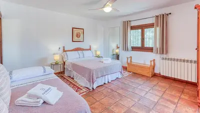 Cama o camas de una habitación en Cortijo el Contarin Archidona by Ruralidays