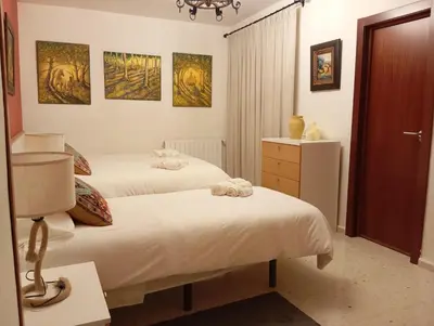 Cama o camas de una habitación en Casa Rural Río Frío