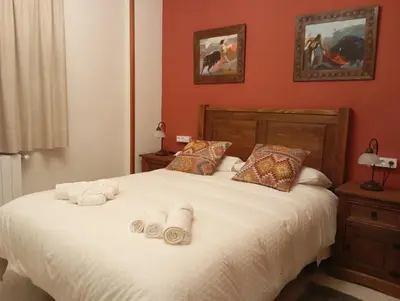 Cama o camas de una habitación en Casa Rural Río Frío