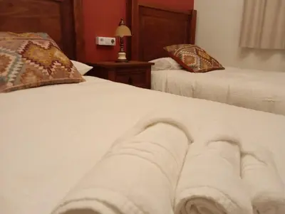 Cama o camas de una habitación en Casa Rural Río Frío