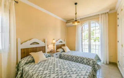 Cama o camas de una habitación en Villa Carmela