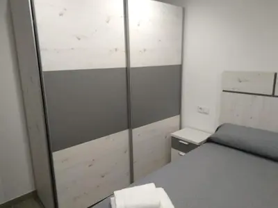 Cama o camas de una habitación en apartamento nuevo