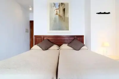 Cama o camas de una habitación en Apartamentos Plaza