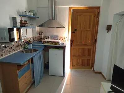 Una cocina o zona de cocina en La Pequeña Parrita