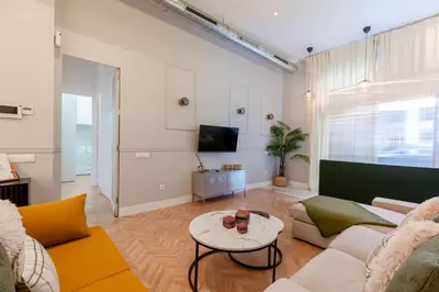 Una televisión o centro de entretenimiento en Amplio apartamento a 5 min de San Luis, luminoso y cómodo