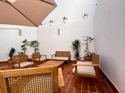 Zona de estar de Apartamento 1 by MezquitaSuites