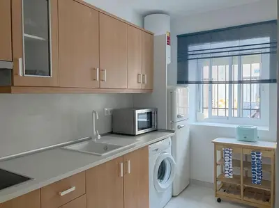 Una cocina o zona de cocina en Renovated retro home w terrace