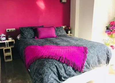 Cama o camas de una habitación en Precioso y moderno ático duplex de 2 habitaciones en Sevilla para 2 ó 3 personas con Jacuzzi