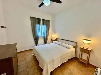 Cama o camas de una habitación en Acogedor apt 8pax 4Bdr 2Bth - CozyHomeSevilla3