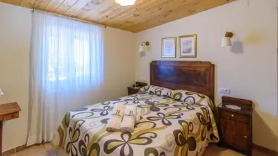 Cama o camas de una habitación en Cortijo el Alcornocal by Ruralidays