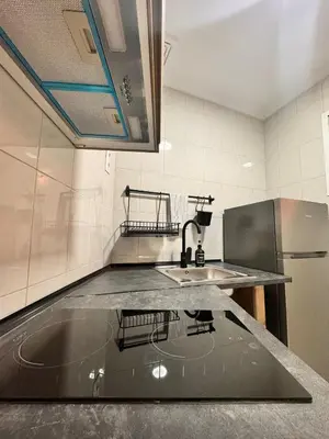 Una cocina o zona de cocina en Wanderlust Apartments
