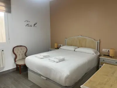 Cama o camas de una habitación en RentalSevilla Cardenal Rodrigo de Castro