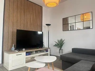 Una televisión o centro de entretenimiento en RentalSevilla Cardenal Rodrigo de Castro
