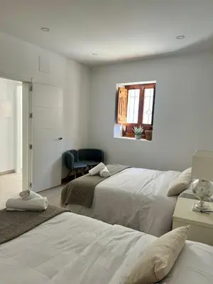 Cama o camas de una habitación en Apartamento Turístico Antequera Centro