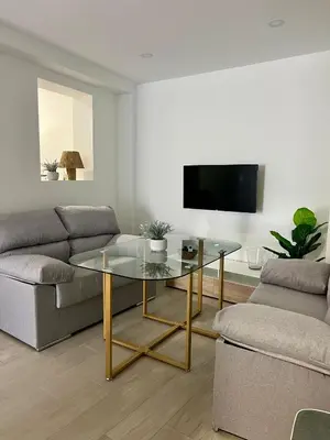 Una televisión o centro de entretenimiento en Apartamento Turístico Antequera Centro