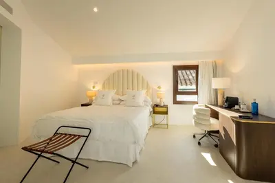 Cama o camas de una habitación en P SANTA CLARA HOTEL BOUTIQUE By Sojo